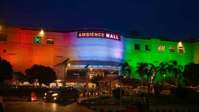 Ambience Mall decorated in Indian tricolour for 80th Independence Day celebrations, featuring the Eternal Flame of Valour installation.